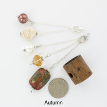 Load image into Gallery viewer, Photo of Autumn scarf slide showing all 5 beads that comes with the scarf slide set and showing a quarter to understand the size of the scarf slide beads. iBella® Scarf Slides and scarf slide sets, jewelry sets.