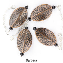 Load image into Gallery viewer, View of several of the brown metal twisted pendants. iBella® Scarf Slides and scarf slide sets, jewelry sets.