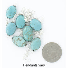 Load image into Gallery viewer, iBella® photo of turquoise color howlite pendants showing the pendants can vary.