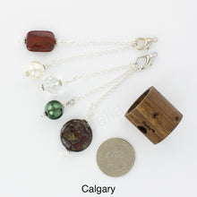 Load image into Gallery viewer, Photo of Calgary scarf slide set with interchangeable beads showing all 5 beads that comes with the scarf slide set and showing a quarter to understand the size of the scarf slide beads. iBella® Scarf Slides and scarf slide sets, jewelry sets.
