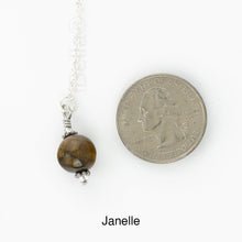 Load image into Gallery viewer, Scarf slide set extra glass pearl titled Janelle - view showing the pearl laying next to a quarter for size reference.