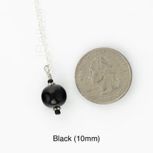 Load image into Gallery viewer, Scarf slide jewelry set extra pearl titled Black (10mm) - view showing the pearl laying next to a quarter for size reference.