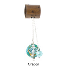 Load image into Gallery viewer, Scarf slide set titled Oregon - alternate view showing the blue pendant. This scarf slide is pictured hanging. iBella® Scarf Slides and scarf slide sets, jewelry sets.