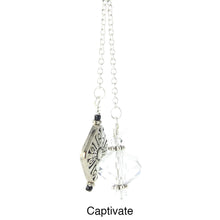 Load image into Gallery viewer, iBella® scarf slide jewelry set named Captivate - view of 2 of the beads, the silver pendant and the crystal. This scarf slide set is pictured hanging. iBella® Scarf Slides and scarf slide sets, jewelry sets.