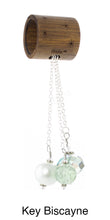 Load image into Gallery viewer, iBella® scarf slide jewelry set named Key Biscayne - alternate scarf slide set bead combination with the glass pearls and crystal. This scarf slide is pictured hanging. iBella® Scarf Slides and scarf slide sets, jewelry sets.