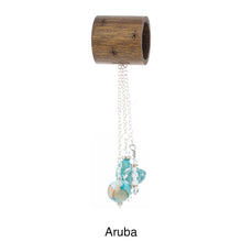 Load image into Gallery viewer, Scarf slide set titled Aruba - another alternate view showing the turquoise pendant. This scarf slide is pictured hanging.