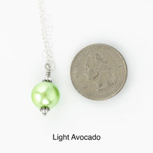 Load image into Gallery viewer, Scarf slide jewelry set extra pearl titled Light Avocado - view showing the pearl laying next to a quarter for size reference.
